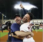  ?? MATT SLOCUM — THE ASSOCIATED PRESS ?? The Astros’ Jose Altuve, right, and Justin Verlander celebrate after winning the ALCS against the Yankees.