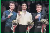  ??  ?? ENTRE RUSOS. Aliev (plata), Javi Fernández (oro) y Kolyada (bronce), en el podio.