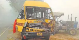  ?? SANJEEV KUMAR/HT ?? The illfated school bus that collided with a tractortra­iler near Talwandi Sabo in Bathinda on Friday.