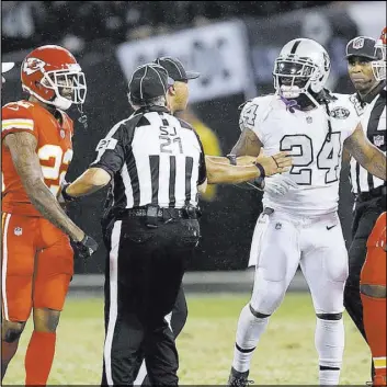  ?? Ben Margot The Associated Press ?? Running back Marshawn Lynch (24) is expected to receive a one-game suspension without pay for pushing an official in Thursday’s game.