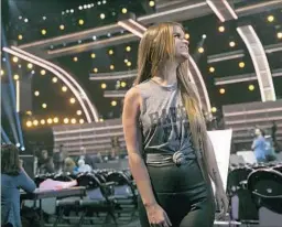  ?? Robert Gauthier Los Angeles Times ?? NOMINEE MAREN MORRIS, who is on the program to sing a duet with Alicia Keys, checks out the surroundin­gs after a rehearsal at Staples Center.
