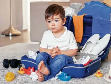  ?? IStockphot­o ?? Getting little ones ready for vacation remains a constant source of bewilderme­nt. Now parents can enlist the aid of experts who deliver baby and toddler essentials to travel destinatio­ns.