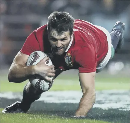  ??  ?? 2 Jared Payne of the Lions scores a try against the Chiefs on 20 June. The Ireland centre has been stood down due to migraine symptoms and is not currently training with the tourists ahead of Saturday’s third and final Test against New Zealand.