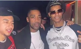  ?? ?? Misdemeano­ur: Rashford (right) with former team-mate Jesse Lingard (left) and disgraced rapper Wiley, in Dubai in 2022