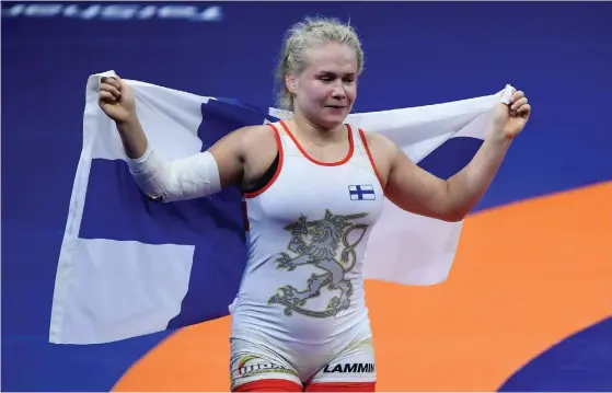  ?? Foto: Lehtikuva/attiLa kiSbenedek ?? Petra Olli firade VM-guld i Budapest.