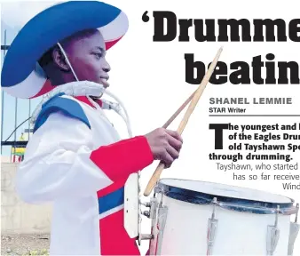  ?? GLADSTONE TAYLOR ?? Despite his height, Tayshawn Spence stands tall as he drums away. The 13-year-old, who is a member of the Eagles Drum and Bugle Core, was out with his fellow musicians at the Emancipati­on Day Float Parade yesterday.