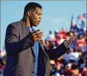  ?? SEAN RAYFORD/GETTY IMAGES/TNS ?? Part of GOP Senate candidate Herschel Walker’s campaign strategy is to try to stay above the political fray and ignore Republican rivals.