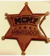  ?? ?? The ‘MCMF Ambassador’ badge given to only a handful of long-time faithful followers and participan­ts of the festival.