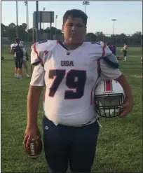  ?? Submitted photo ?? STANDING TALL: Fountain Lake freshman lineman Nicholas Soileau prepares for the USA Football Middle School Bowl Game in Frisco, Texas. Soileau was one of seven offensive linemen chosen to play for the Stripes.