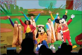  ?? PHIL MCCARTEN ?? The gang waves to the audience in a performanc­e of Phil McCarten of “Disney Junior Live on Tour: Costume Palooza.”