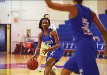  ?? KELVIN GREEN/TRI-LAKES EDITION ?? September Ware dribbles the ball down the court during practice for the Lady Badgers.