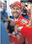  ?? FOTO: DPA ?? Ferrari-Pilot Sebastian Vettel hat derzeit gut lachen.