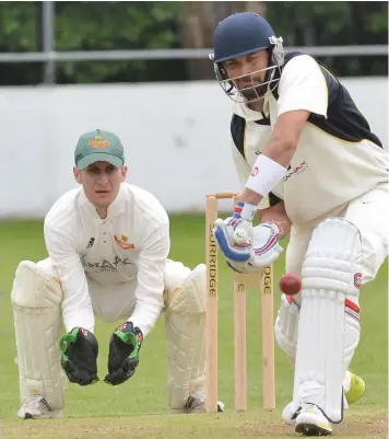  ??  ?? Raj Kumar scored a crucial half-century to help Burslem beat Bagnall Norton, while, right, Longton skipper Ed Jones was among the wickets in his side’s crushing victory.