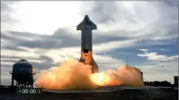  ?? Photo: AFP ?? The Starship SN10 prototype during the second attempted test flight of the day at SpaceX’s South Texas test facility near Boca Chica Village in Brownsvill­e, Texas, on Wednesday