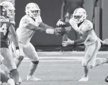  ?? CHARLES TRAINOR JR. ctrainor@miamiheral­d.com ?? Dolphins rookie quarterbac­k Tua Tagovailoa (1) will make the first start of his pro career when Miami faces the Los Angeles Rams on Nov. 1.