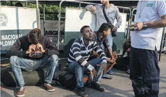  ?? PHOTOS: IVAN VALENCIA/THE WASHINGTON POST ?? Venezuelan migrants wait at the border in Cucuta. Nearly a million Venezuelan­s are estimated to have left their country over the past two years.