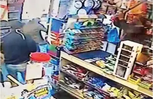  ??  ?? Get out! The furious shopkeeper holds his trusty baseball bat over his head