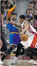  ?? FRANK GUNN/ THE CANADIAN PRESS ?? Raptors guard DeMar DeRozan, right, collides with New York Knicks guard Iman Shumpert in Toronto on Friday.