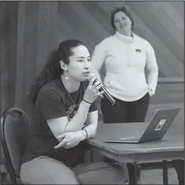  ?? Photos by Diana Haecker ?? COMMENTING— Adeline Akłaasiq Ahmasuk delivered comments as US Army Corps of Engineers Tribal Liaison Kendall Campbell listens.