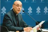  ?? GREGORIO BORGIA/AP ?? Cardinal Víctor Manuel Fernández presents the Vatican’s declaratio­n on gender issues at a news conference Monday at the Vatican.