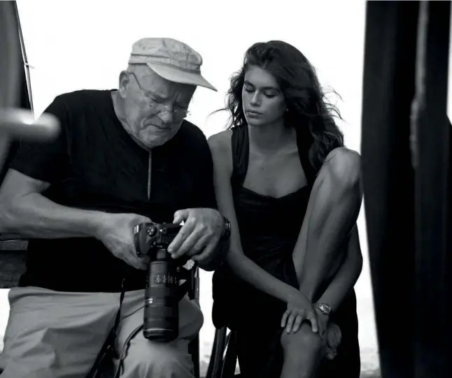  ??  ?? CANDID CAMERA The SLIM campaign PICKINGS for the Trésor The 36mm was version shot by of legendary the Trésor photograph­er measures a Peter mere Lindbergh 8.85mm (pictured in thickness, left), which who is makes seen above the watch discussing incredibly lightweigh­t the shot with and Kaia comfortabl­e Gerber to wear