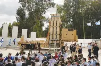  ?? (Reuters) ?? ISRAEL’S DAVID’S SLING missile-intercepti­ng system is unveiled Sunday at its initial operationa­l capability (IOC) ceremony at Hatzor Air Force Base.