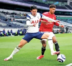  ??  ?? Tottenham Hotspur’s South Korean striker Son Heung-Min (left) fights for the ball with Manchester United’s Brazilian midfielder Fred during the English Premier League football match between Tottenham Hotspur and Manchester United on Sunday.