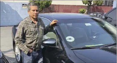  ?? PHOTO EDHUAR ARELLANO VIA CALMATTERS ?? Edhuar Arellano has been driving for Uber and Lyft for four years. He says the companies should make drivers employees. COURTESY