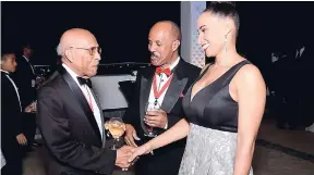  ??  ?? Dr Alverston Bailey (centre), past MAJ president introduces his daughter, Dr Krystle Bailey, to Dr the Hon John Hall, MAJ past president, at the MAJ Annual Awards and Banquet 2018.