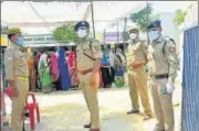  ??  ?? Commission­er of police (Varanasi) A Satish Ganesh inspecting a polling centre at a primary school in Shivpur area of Varanasi.