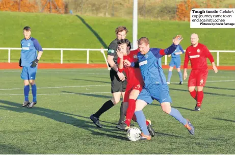  ??  ?? Tough tussle Carluke’s cup journey came to an end against LocheePict­ures by Kevin Ramage