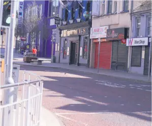  ??  ?? More high streets, such as Bangor’s, are seeing increasing closures of shops