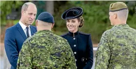  ?? GETTY IMAGES ?? The royals with troops from Commonweal­th countries.