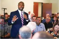  ?? The Associated Press ?? Sen. Tim Scott, R-S.C., speaks during an Iowa GOP reception on Thursday in Cedar Rapids, Iowa. At least a half dozen GOP presidenti­al prospects are planning Iowa visits this summer, forays that are advertised as promoting candidates and the state Republican organizati­on ahead of the fall midterm elections. But in reality, the trips are about building relationsh­ips and learning the political geography in the state scheduled to launch the campaign for the party’s 2024 nomination.