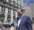  ?? Kevin Hagen, The Associated Press ?? Geoffrey S. Berman, United States attorney for the Southern District of New York, speaks to reporters as he arrives at his office in New York on Saturday.