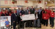  ?? SUBMITTED PHOTO ?? Weis Markets presented a $450,000donatio­n to Paralyzed Veterans of America generated through a six-week in-store fundraisin­g campaign.