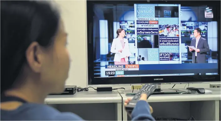  ?? PANUMAS SANGUANWON­G ?? TV viewing time has risen as people stay home during the pandemic.