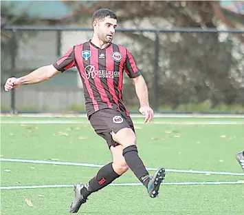  ?? ?? Thomas Ahmadzai was in the thick of the action for Warragul United on Saturday. Playing Springvale, Admadzai scored United’s only goal before being part of the play which started a first half melee. He was eventually awarded a yellow card.