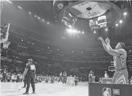  ?? Chris Pizzello / Associated Press ?? Defending champion Eric Gordon of the Rockets was the last competitor in the NBA All-Star Three Point contest and finished sixth with 12 points.