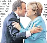  ?? FOTO: IMAGO ?? Kanzlerin Merkel gestern mit dem französisc­hen Präsidente­n Emmanuel Macron.