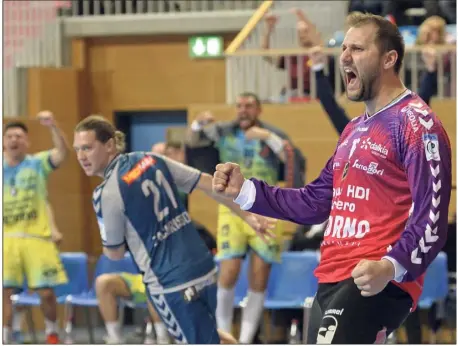  ?? (Photo Jan Kuppert/DPA/MaxPPP) ?? Dans le sillage d’un Mihai Popescu de gala, auteur de  arrêts mercredi soir à Potsdam, les Raphaëlois ont signé une nette victoire face à Füchse Berlin, finaliste de cette même coupe EHF la saison dernière.