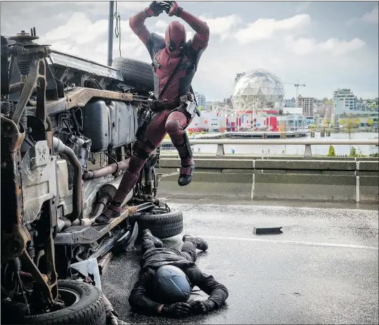  ??  ?? A scene from the new movie Deadpool, which was filmed in Vancouver — as the background of Science World makes apparent. Ryan Reynolds plays the titular character in the film, which comic-book fans say pushes the superhero genre in a different direction.