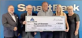  ?? Contribute­d ?? From left, state Sen. Jeff Mullis, Barry Watson, Emerson Russell, Natalie Hunt and Juanita Hamblen attend the check presentati­on.