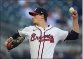  ?? JOHN BAZEMORE — THE ASSOCIATED PRESS ?? Braves starting pitcher Max Fried delivers to a Marlins batter in the first inning on Tuesday in Atlanta.