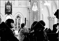  ?? GAO ERQIANG / CHINA DAILY ?? Worshipper­s attend services at the newly refurbishe­d Xujiahui Cathedral in Shanghai on Sunday.