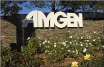  ?? MARK J. TERRILL — THE ASSOCIATED PRESS ?? Amgen, based in Thousand Oaks, has announced it will acquire Horizon Therapeuti­cs, an Irish biopharmac­eutical company that focuses on treatments for rare and autoimmune diseases, in a deal valued at $27.8billion. Amgen shares dipped slightly on the news Monday.