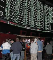  ?? GETTY IMAGES ?? Bettors line up to place wagers on Super Bowl LI at the Westgate Resort & Casino in Las Vegas, where the Raiders will relocate for the 2020 season.
