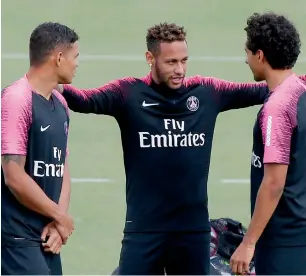  ?? — AP ?? PSG’s Neymar, Thiago Silva (left) and Marquinhos during a training session on Friday.