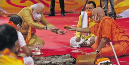  ??  ?? Indian Prime Minister Narendra Modi (top left), takes part in the groundbrea­king ceremony in Ayodhya, Uttar Pradesh, India.