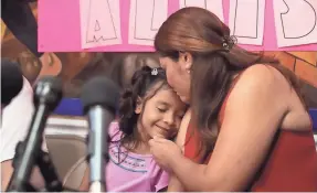  ?? CASEY JACKSON/USA TODAY NETWORK ?? Alison Jimena Valencia Madrid, 6, left, was reunited with her mother, Cindy Alinette Madrid-Henriquez, on Friday in Houston.